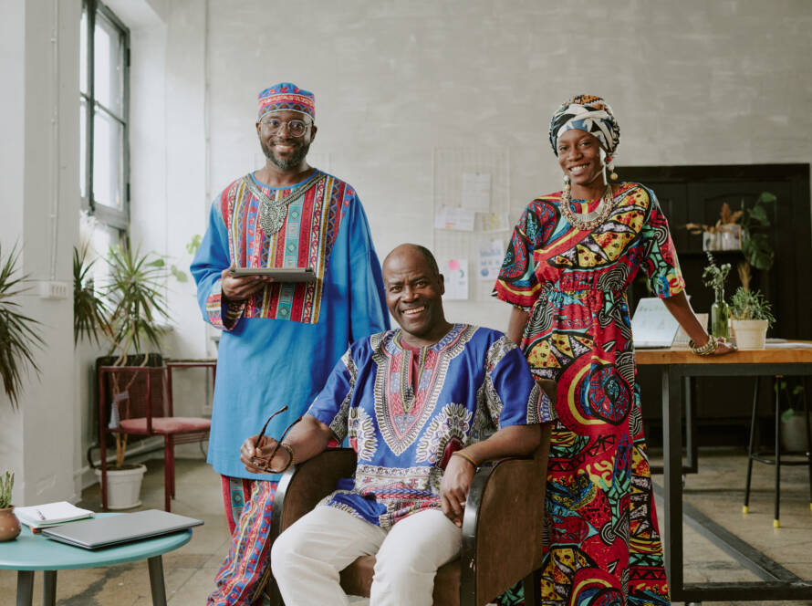 Portrait of African American businessmen posing for photo together in modern loft office