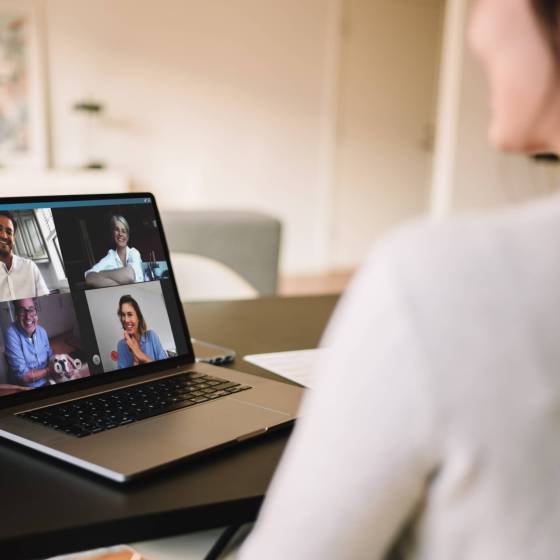 Woman  having a video conference with friends. Family meeting online over a video call.